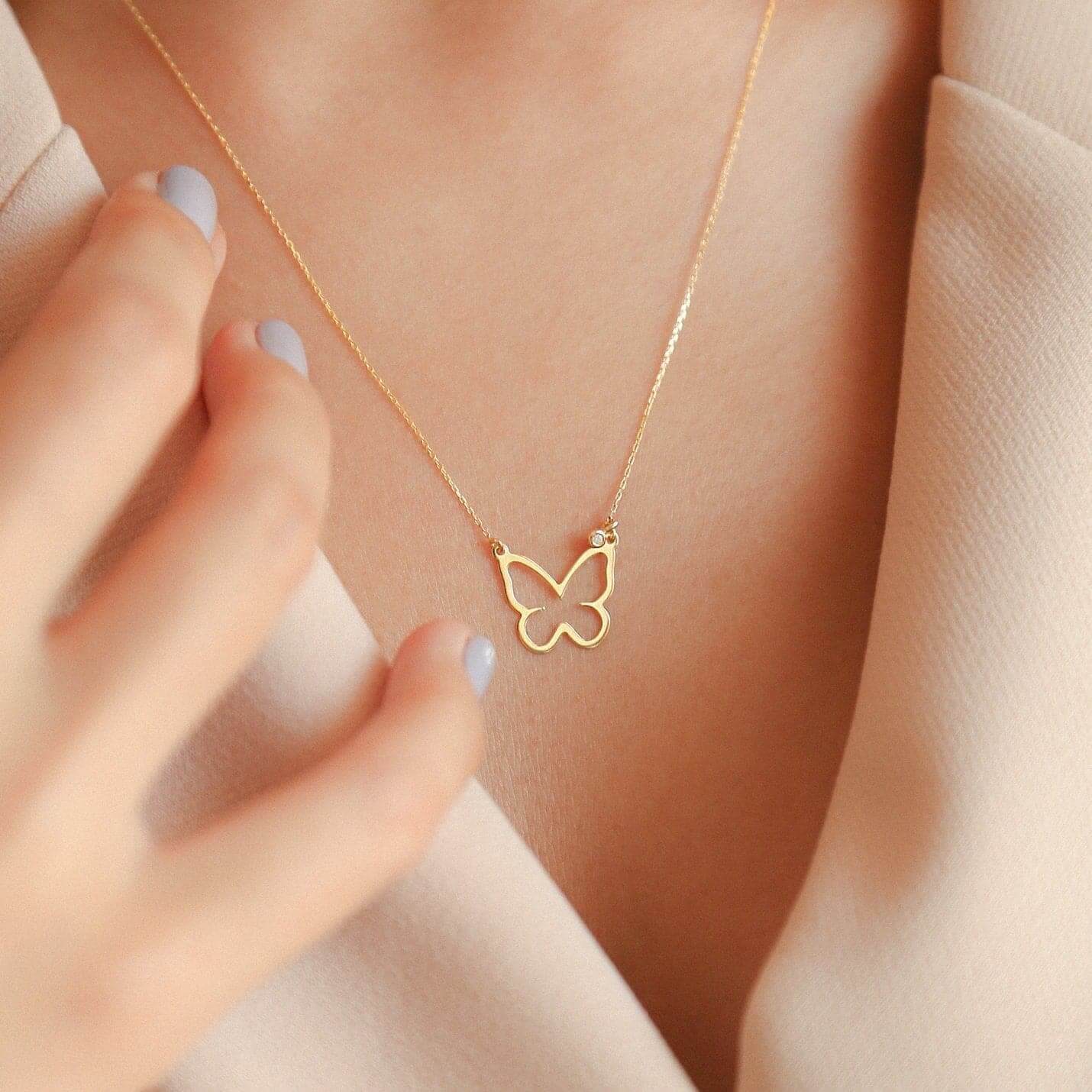 Collier Papillon en diamant en or massif 14 carats.