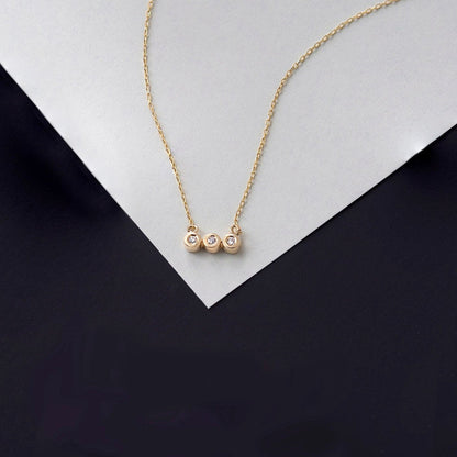 1/33 CT. T.W. Three Stone Diamond Pendant Necklace in 14K Solid Gold