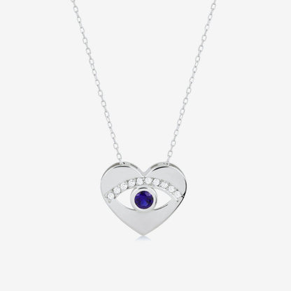 Collier pendentif œil de protection cœur en saphir et diamant de 0,05 CT. et 0,125 CT. en or 14 carats