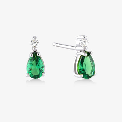 Boucles d'oreilles en diamant et émeraude en or 14 carats.