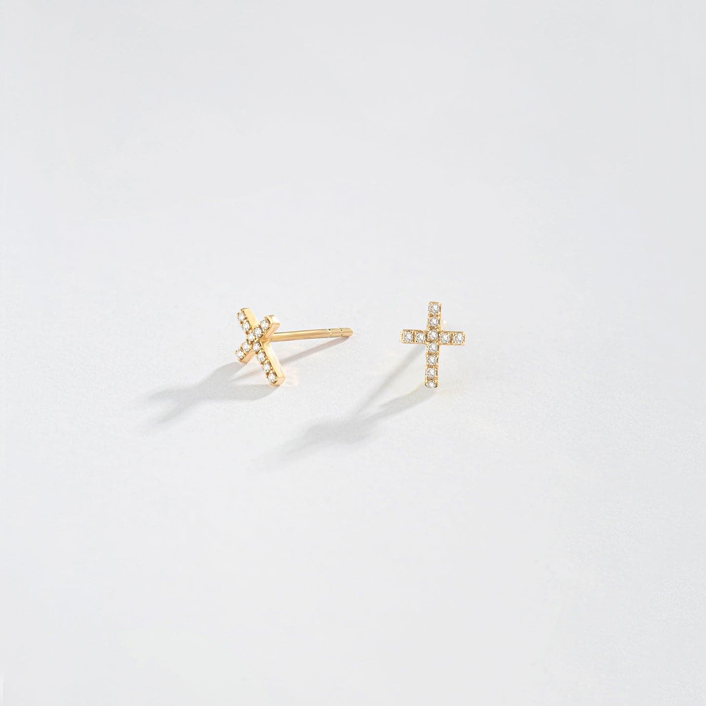 1/10 CT. T.W. Diamond Accent Cross Stud Earrings in 14K Solid Gold