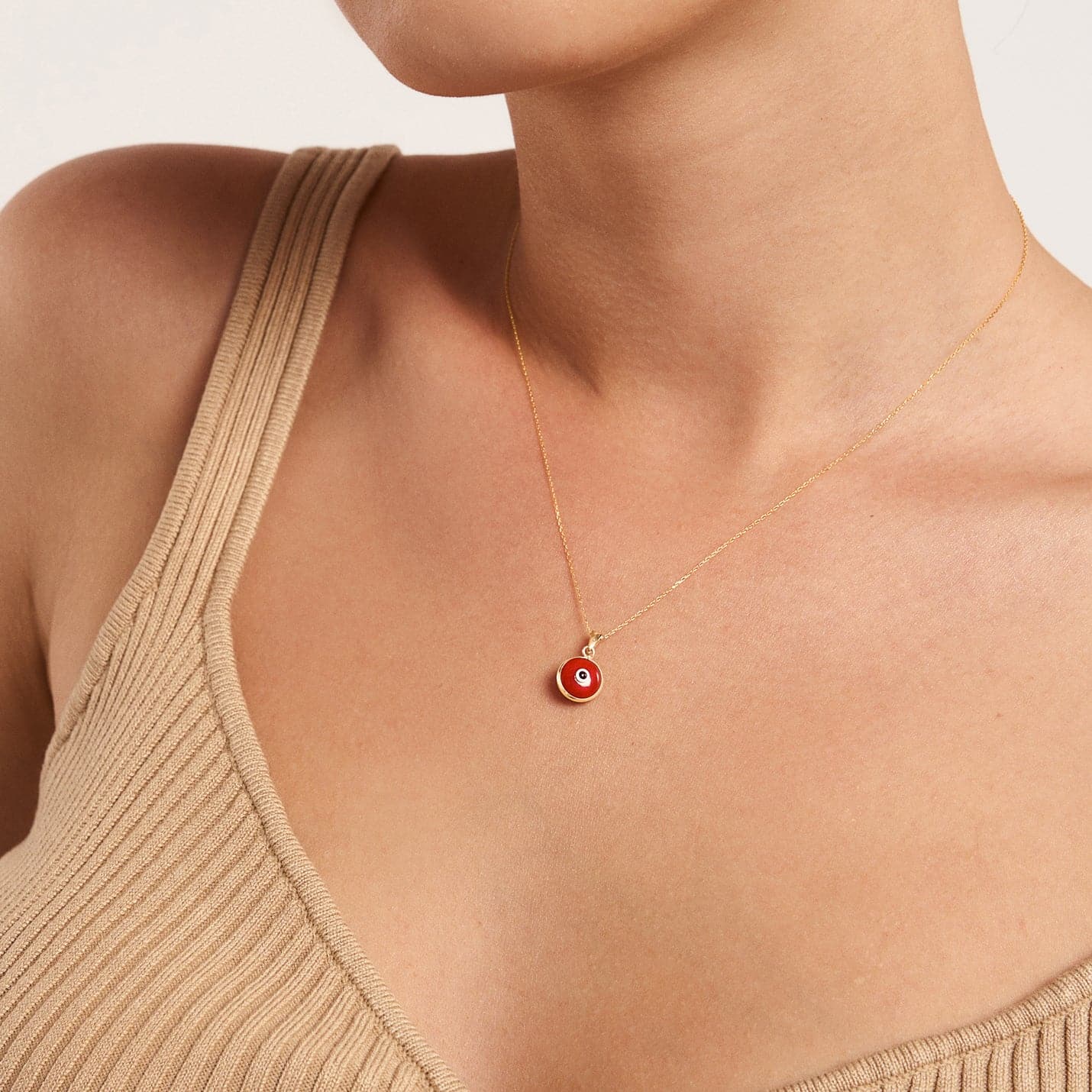 Collier pendentif œil maléfique rouge en or 14 carats