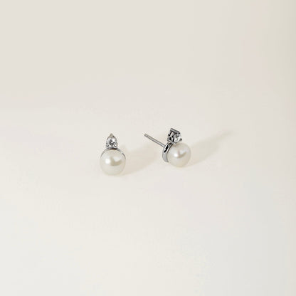 Boucles d'oreilles clou avec perle de culture d'eau douce et diamant en or 14 carats