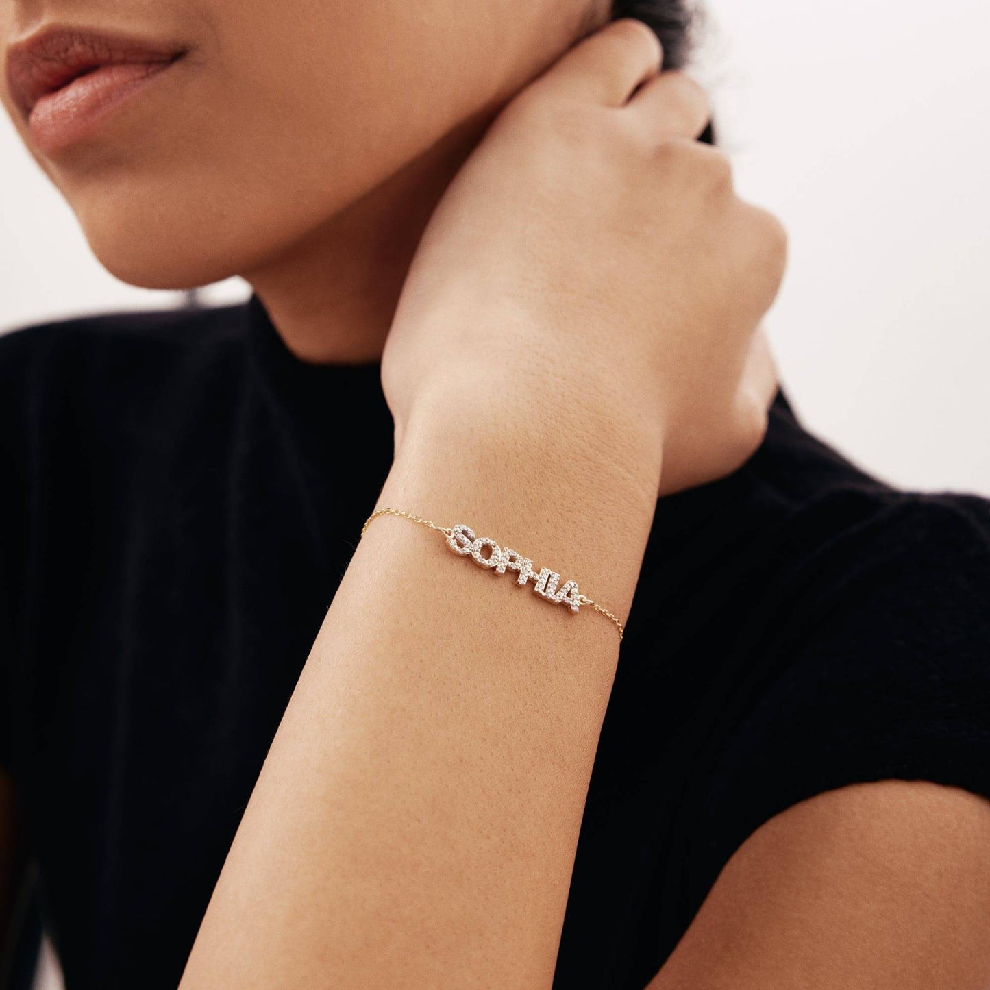 Bracelet avec le nom en diamant en or 14 carats