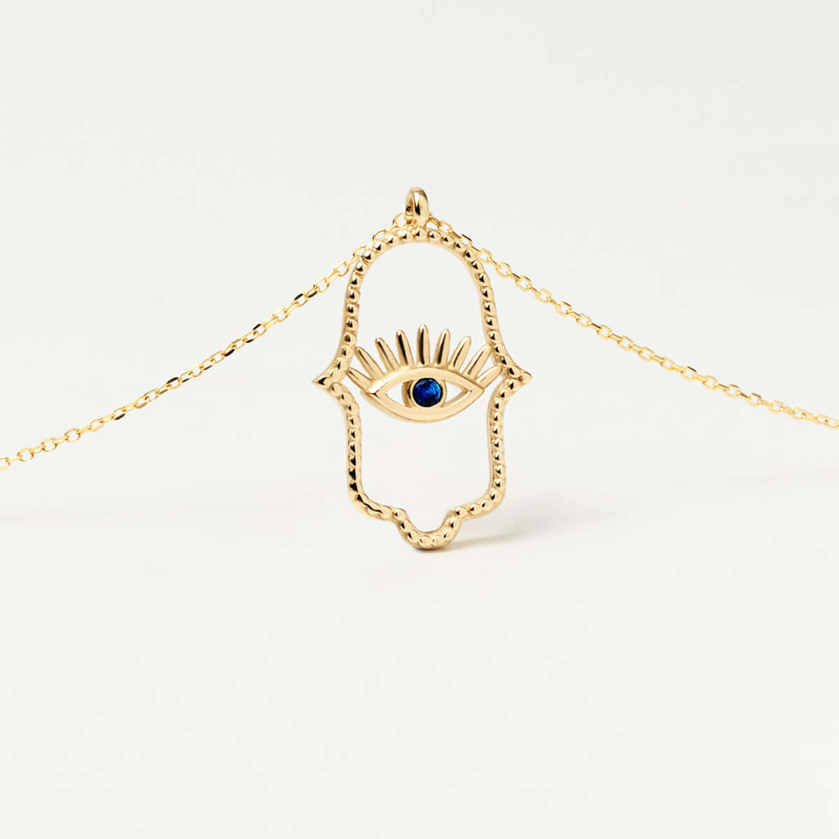 Collier Hamsa avec œil maléfique en saphir et or 14 carats