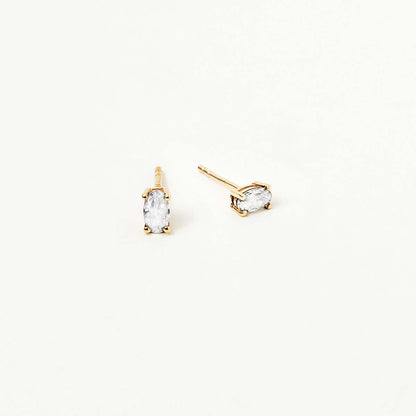 Boucles d'oreilles clous avec pierre de naissance en forme de solitaire ovale en or 14 carats.