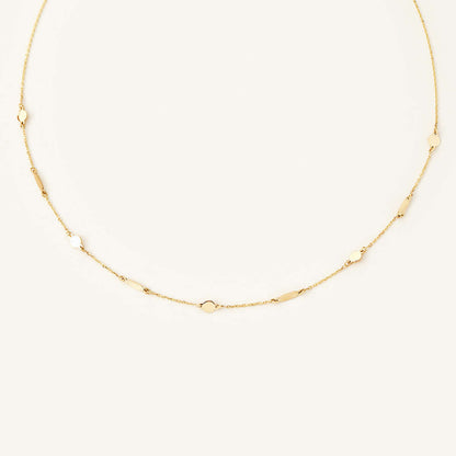 Collier à pendentif en forme de bâton et disque rond en or 14 carats.