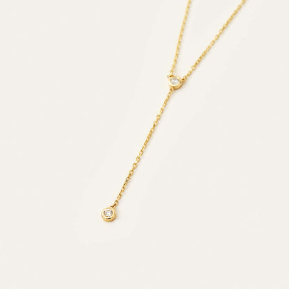 Collier à pendentif lariat avec sertissage de diamants en or 14 carats