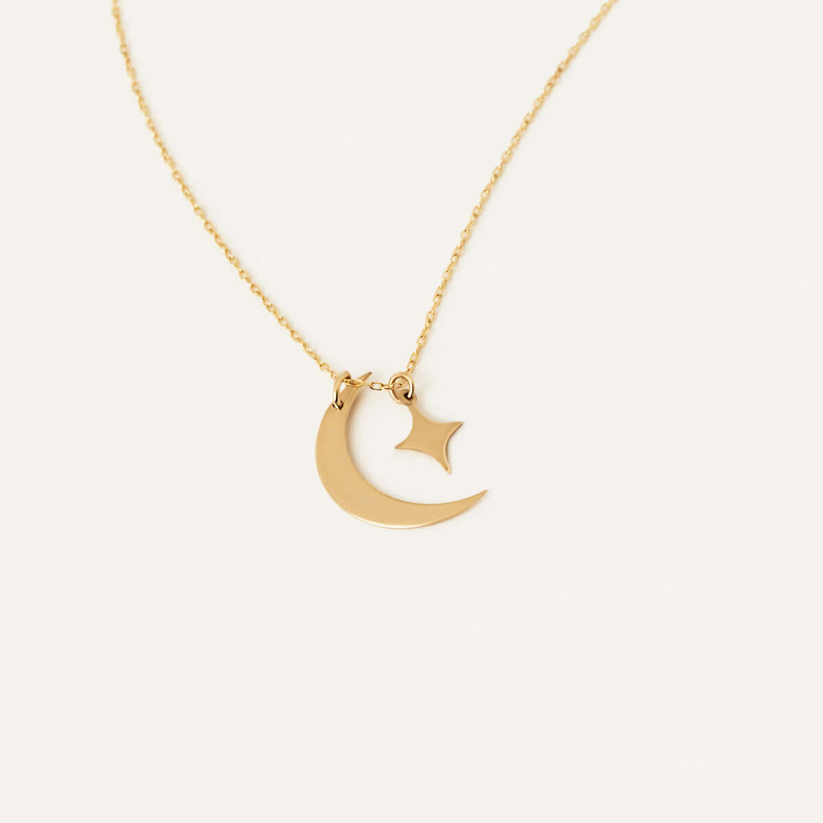 Collier croissant de lune et étoile en or massif 14 carats