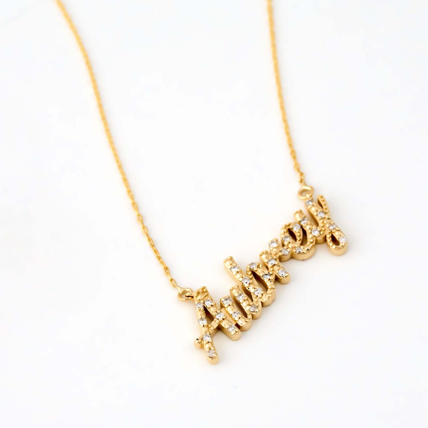 Collier avec nom en lettres cursives en or massif 14 carats