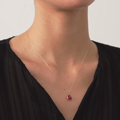 Collier pendentif œil maléfique rouge en or 14 carats